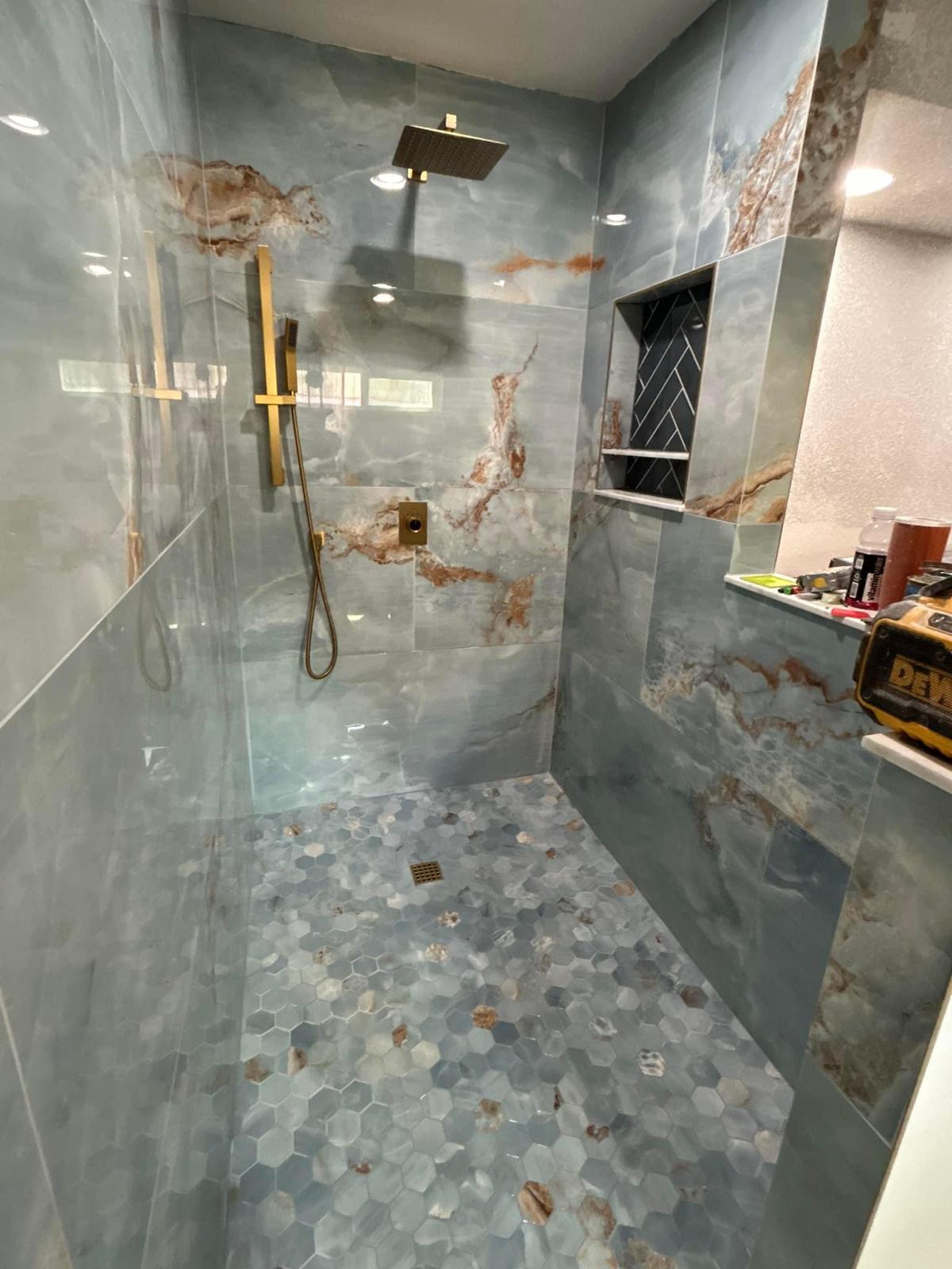 Custom shower and decorative tile installation